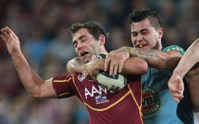 Queensland skipper Cameron Smith (left).