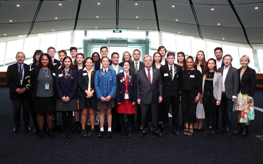 United Nations Secretary-General Antonio Guterres (centre) with climate and environmental change youth leaders and Climate Change Minister James Shaw (centre back) at Auckland War Memorial Museum  on May 13, 2019.