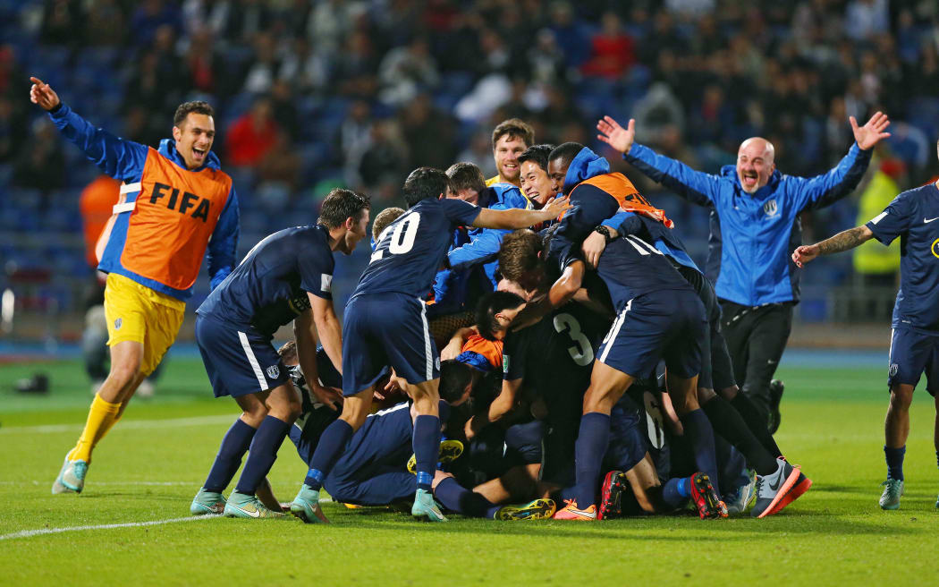 Auckland City players celebrating their third place finish at the 2014 FIFA Club World Cup.