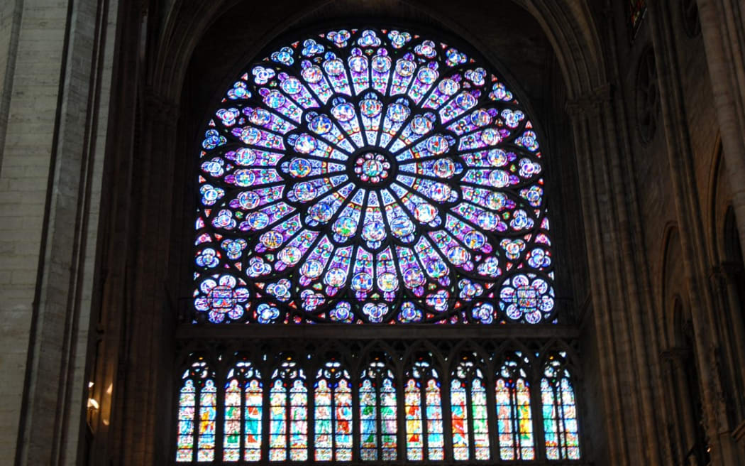 --FILE--Interior view of the Notre-Dame de Paris, also known as Notre-Dame Cathedral or simply Notre-Dame, in Paris, France, 11 August 2008.

French president Emmanuel Macron pledged to rebuild Notre Dame cathedral after a blaze devastated large parts of the gothic gem on Monday. French firefighting official said the two towers of Notre Dame had been saved from total destruction in the fire which continues to burn in Paris. The fire broke out at the medieval cathedral in central Paris on Monday afternoon. (Photo by Stringer / Imaginechina / Imaginechina via AFP)