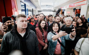 Someone taking a selfie with Jacinda Ardern in Auckland on 16 October 2020.