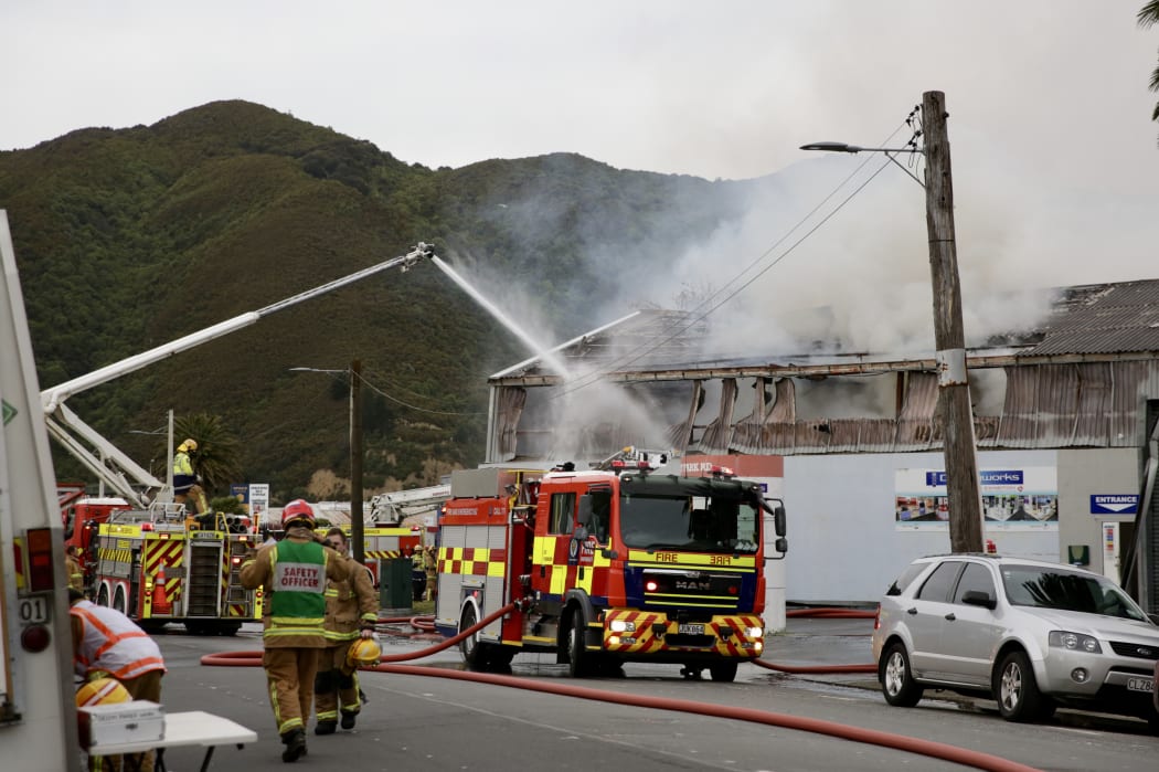 Firefighters tackle a large blaze in a commercial building in the Lower Hutt suburb of Gracefield.