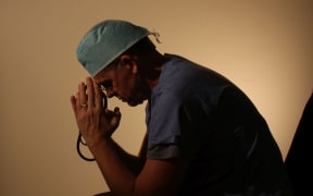 Stressed doctor, doctor burnout, burnt out doctor, doctor generic
