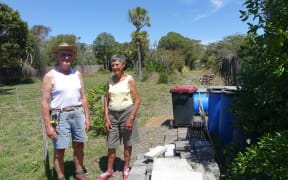 Peter and Marion Neal say the Crown shouldn’t be able to stop them making use of their driveway, which is surrounded by redzone land. The gate on the left hand side of the photo marks the end of their driveway.