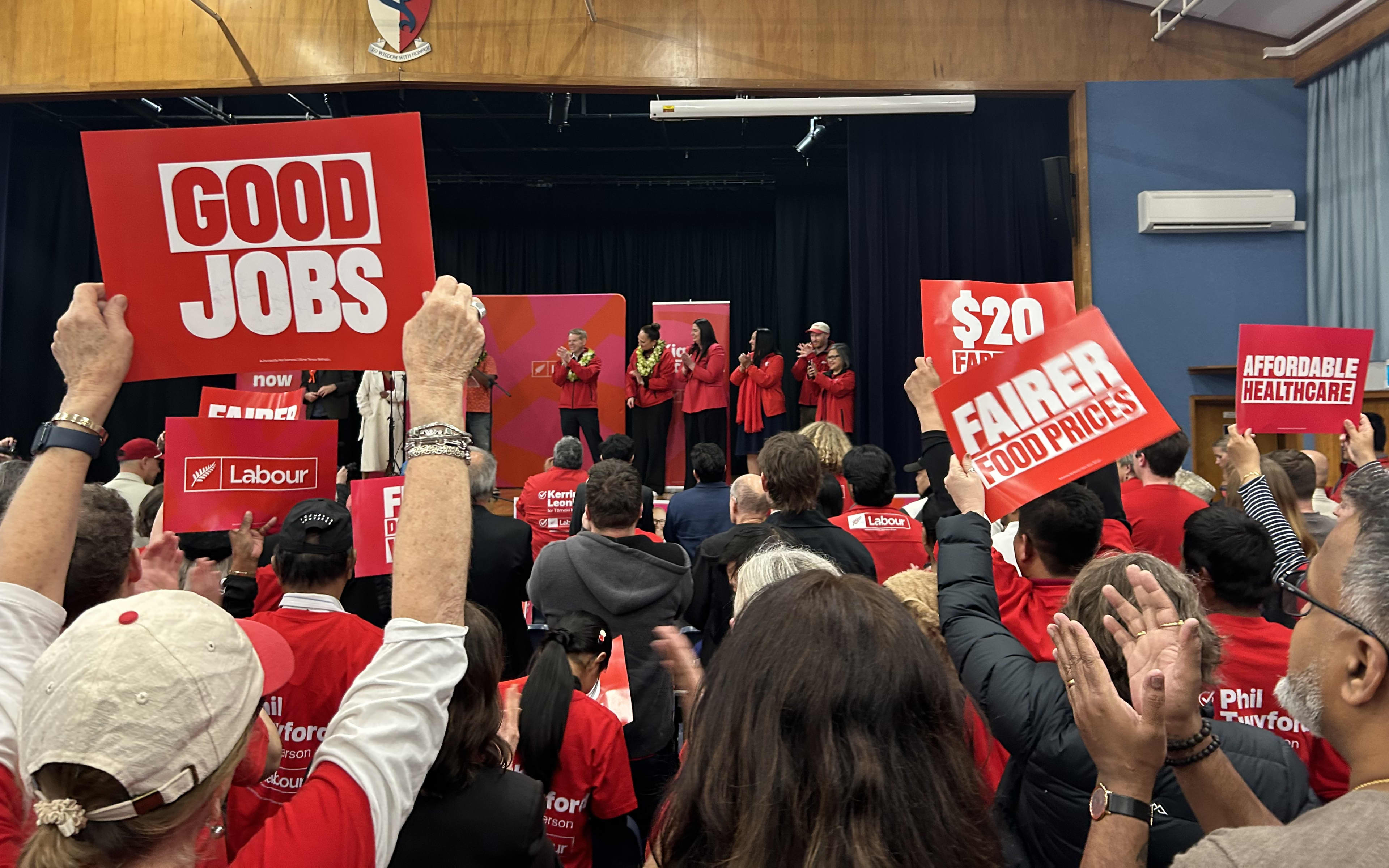 Labour supporters cheering on leader Chris Hipkins and local candidates.