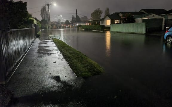 Greenpark Street in Hoon Hay on 26 July 2022, where residents say it's the worst flooding they've ever seen.