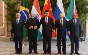 Brazil's President Michel Temer poses with India Prime Minister Narendra Modi, China President Xi Jinping,  Russian President Vladimir Putin and South Africa President Jacob Zuma (R) for a group photo at the West Lake State Guest House in Hangzhou.