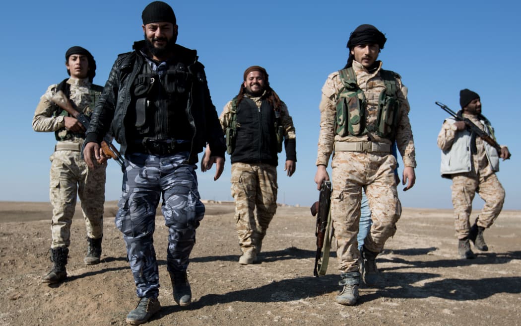 At the front line in the near of Ash Shaddadah in the East of Syria a fighter of the Sunni Sannadid unit from the Al Shammar tribe which is a part of the SDF (Syrian Democratic Forces) who is fighting the Islamic State
