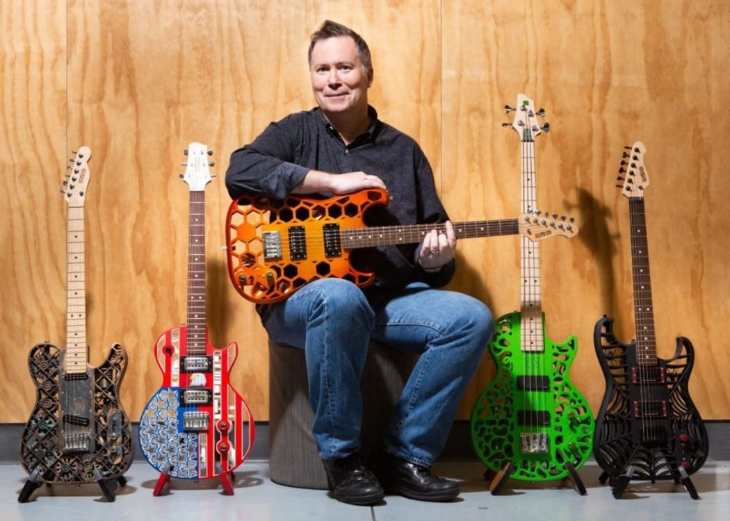 Prof Olaf Diegel with part of his collection of 3D-printed guitars