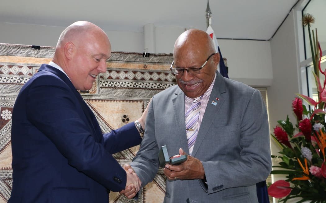 New Zealand Prime Minister Christopher Luxon and Fiji Prime Minister Sitiveni Rabuka have met ahead of their bilateral. Rabuka gave Luxon, a Crusaders fan, a Fijian Drua shirt which Luxon took in his stride. Luxon gifted Rabuka with a Hoehner harmonica, one of only three in New Zealand.