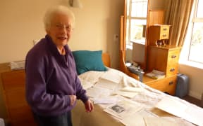 Singing teacher Honor McKellar with a collection of memorabilia from her career