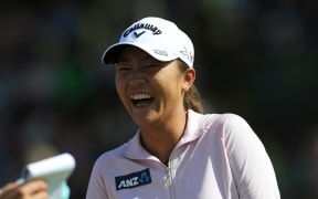 Lydia Ko reacts after winning the Evian Championship on September 13, 2015 in the French Alps town of Evian-les-Bains.