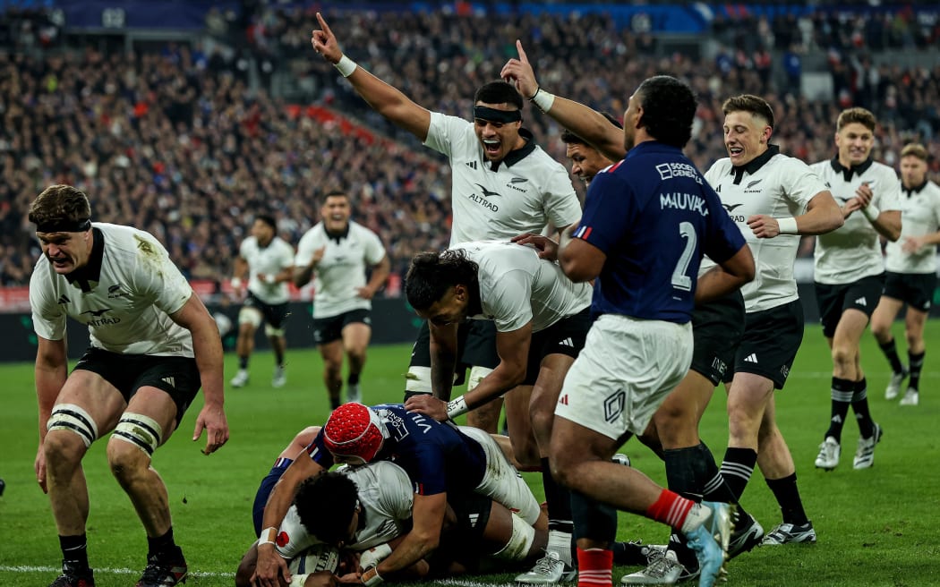 New Zealand's Peter Lakai scores a try against France, 2024.