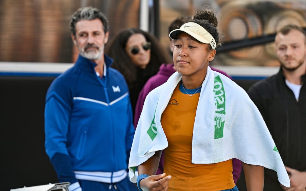 Naomi Osaka of Japan retires from the match against Clara Tauson of Denmark.