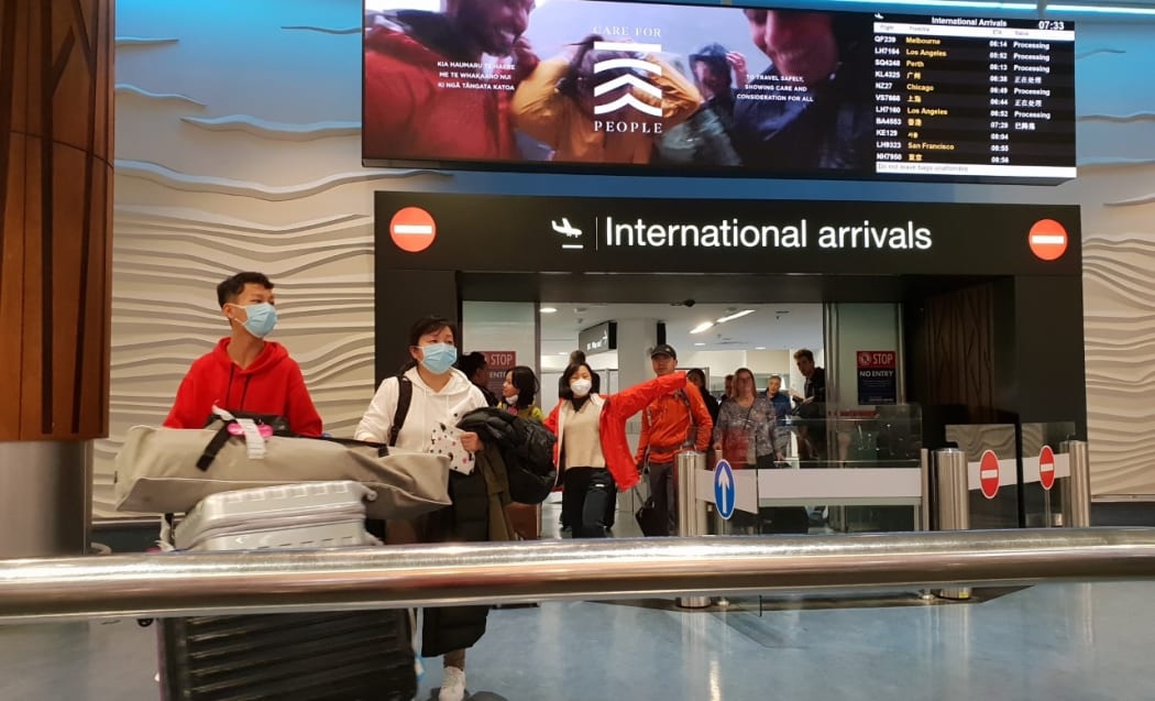 Passengers from international flights at Auckland Airport on Monday 27 January, after flights from Guangzhou and Shanghai had touched down.
