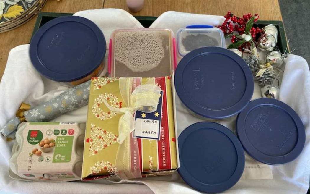 Laura Caygill ended up testing positive for Covid-19 just prior to Christmas, meaning she couldn't celebrate with her family or go to her friend's wedding. Her family delivered Christmas lunch and some supplies along with a secret Santa present on Christmas Day.