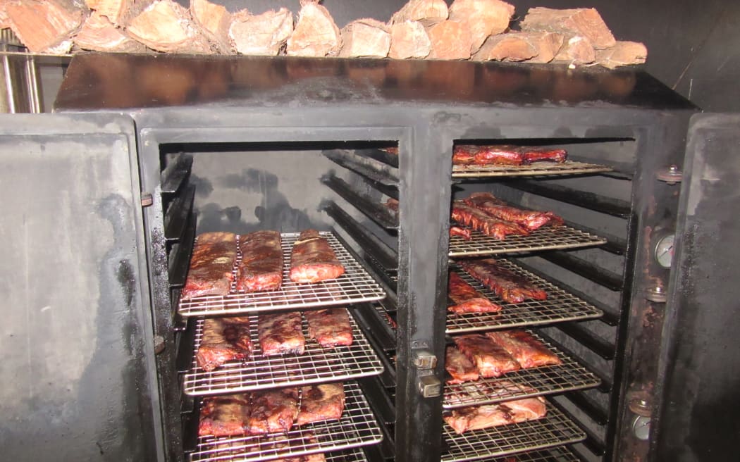 Meat cooks for up to 16-18 hours on Croydon Cole's smoker at Smokin Cole BBQ in Grey Lynn.