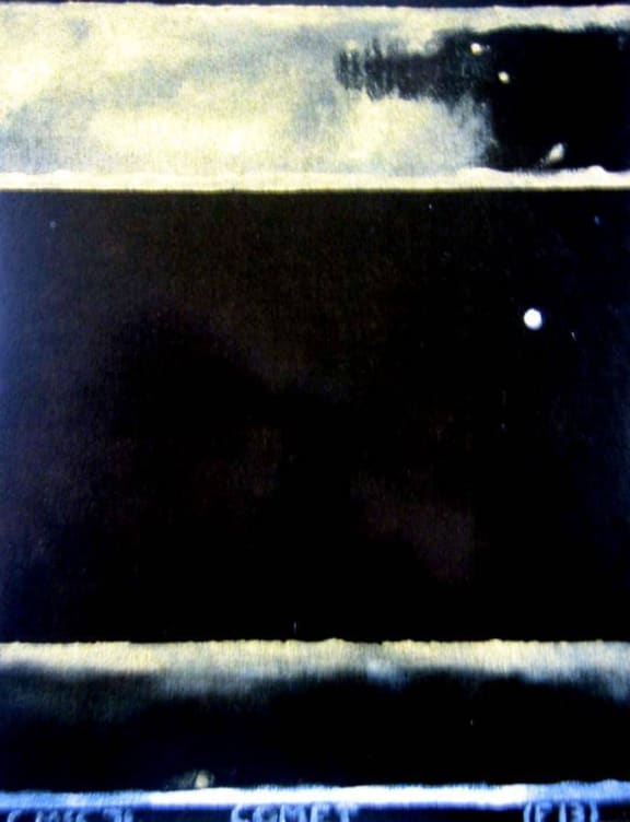 The painting depicts a night scene. Colin McCahon