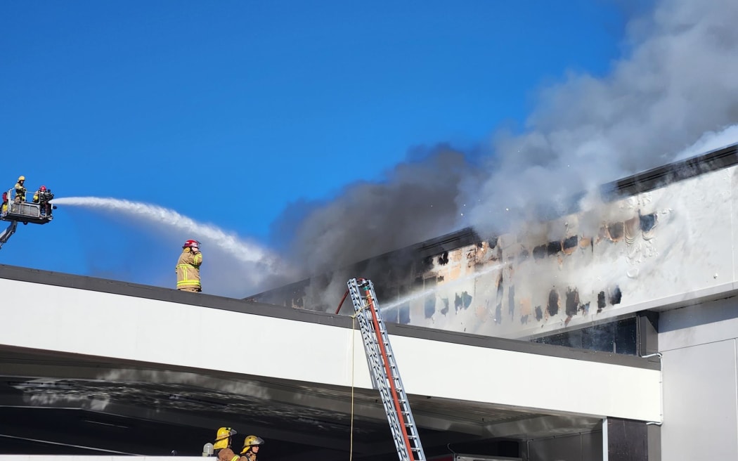 One stretch of wall above the carpark is badly damaged after open flames burst through