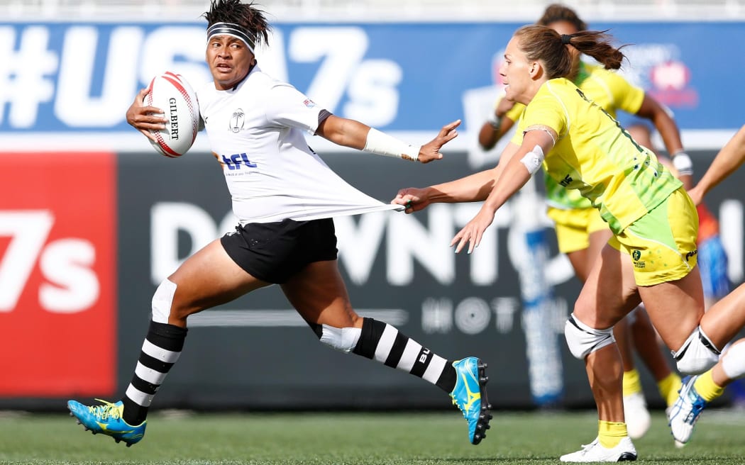 Lavenia Tinai breaks the tackle against Australia during the Cup quarter finals in Las Vegas.