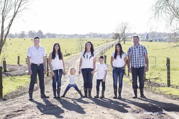 Nicola Ballantyne–Turner (center) and her family when she worked as an AB technician before being promoted to a managerial role in 2022.