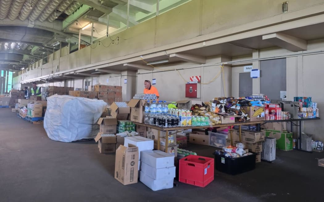 The Hastings' Tomoana Showgrounds has been transformed into a regional distribution hub for volunteers, Civil Defence staff, and military personnel to sort through donated clothing, food, and other supplies.