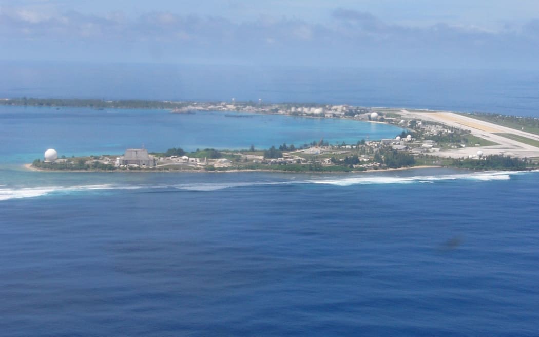 The headquarters island for the Reagan Test Site seen from an approaching plane. The US military has invested billions of dollars to develop the missile test range at Kwajalein since the mid-1960s