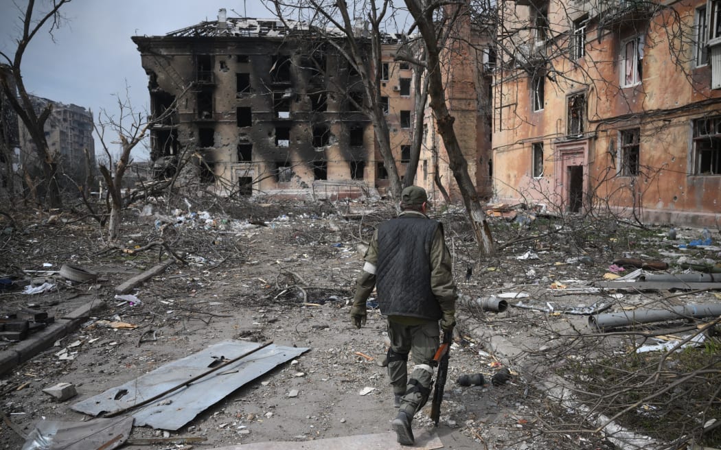 A serviceman of militia of Donetsk People's Republic (DPR) is seen on a front line in Mariupol.