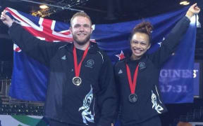 Bronze medallists in wrestling Sam Belkin & Tayla Ford.