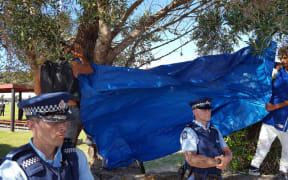 A tarpaulin was put up to block the media's view of Te Tii Marae.