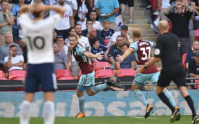 Chris Wood celebrates his first premier league goal for Burnley.