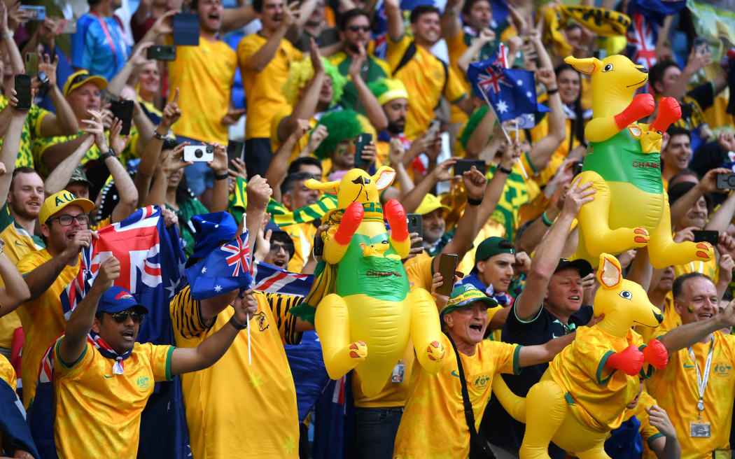 Australia fans celebrate the 1-0 win during the FIFA World Cup Qatar 2022 Group D match between Tunisia and Australia at Al Janoub Stadium on November 26, 2022 in Al Wakrah, Qatar.