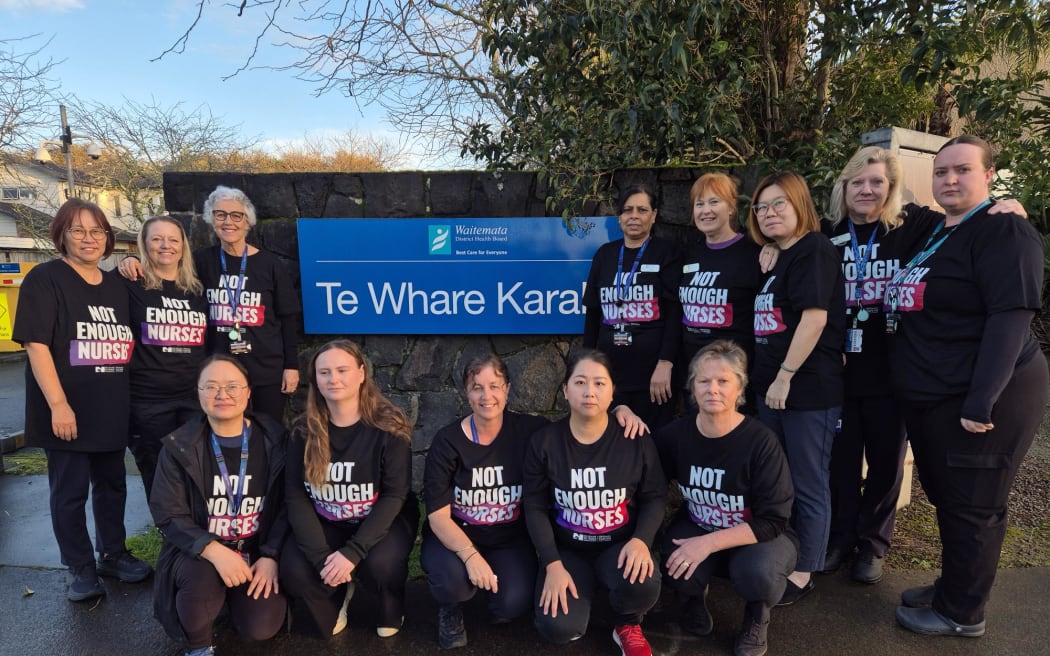 District nurses on Auckland's North Shore wear t-shirts saying 'Not Enough Nurses' as part of industrial action over staffing levels.