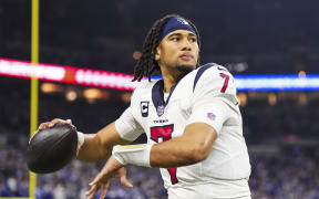 C.J. Stroud #7 of the Houston Texans warms up.