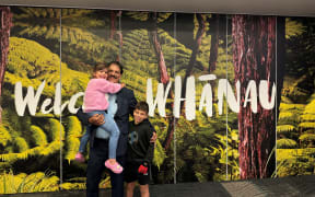 Derek Telles reunited with his grandchildren at Auckland Airport.