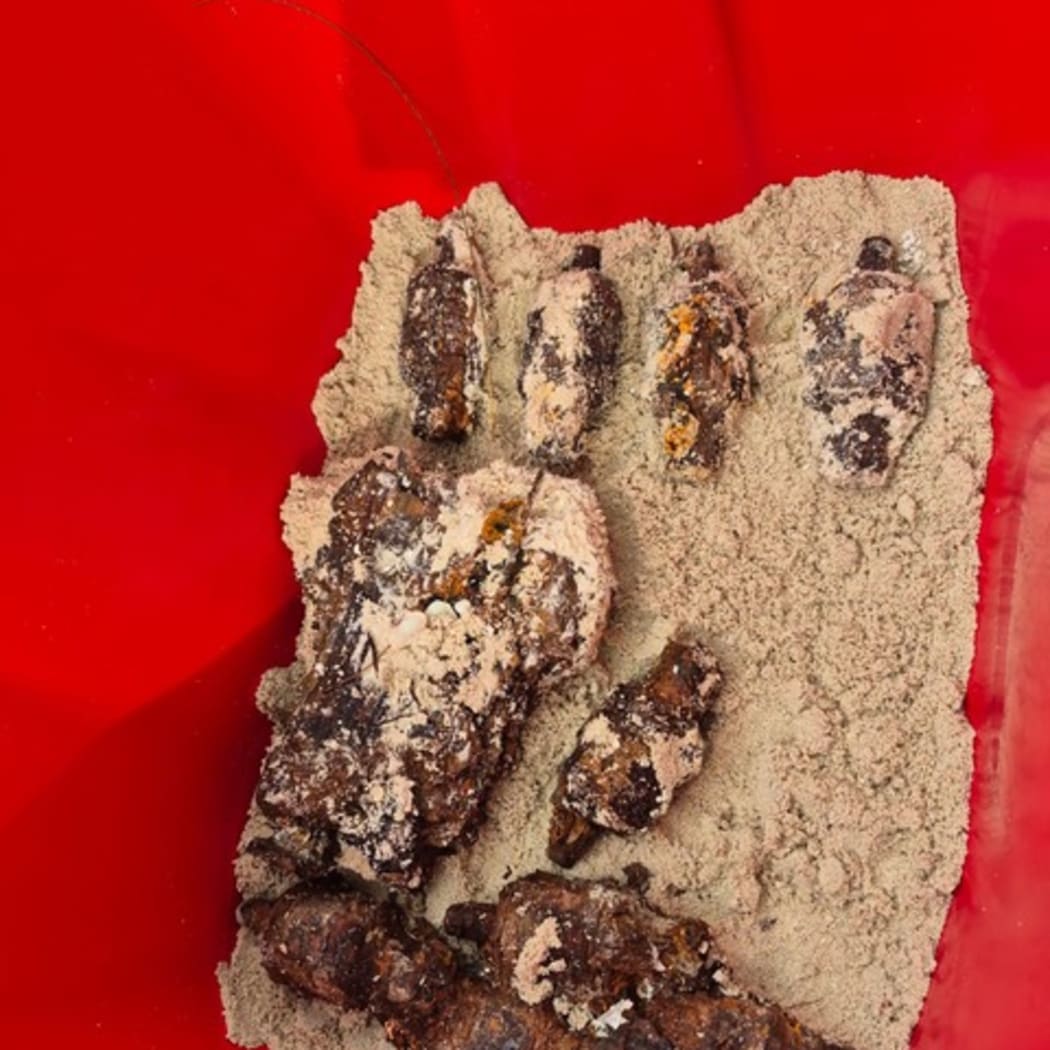 Authorities collaborated to carefully extract land mines, mortar rounds, artillery shells, grenades, and tens of thousands of small arms ammunition from what is suspected was a hidden World War II-era bunker near Micro Beach.