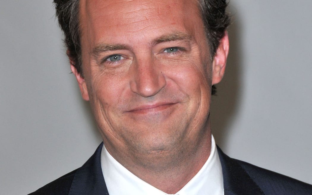 (FILES) Actor Matthew Perry attends the ABC Disney summer TCA press tour at the Beverly Hilton in Beverly Hills on August 1, 2010. At least one person has been arrested in connection with the ketamine overdose death last year of "Friends" actor Perry, US media reported on August 15, 2024. NBC, citing law enforcement officials, said one arrest had been made, while TMZ said there had been "multiple" arrests including one doctor, as investigators probed how Perry obtained the drug. (Photo by Chris Delmas / AFP)