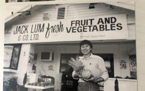 Jack Lum in front of his first shop, Remuera, Auckland, 1970