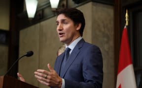 Canada's Prime Minister Justin Trudeau speaks during a news conference about the US tariffs against Canada on March 4, 2025 on Parliament Hill in Ottawa. Trudeau said that President Donald Trump imposed tariffs on Canada to destroy the country's economy to make it easier for the United States to annex its northern neighbor. The extraordinary warning about Trump's threat to Canadian sovereignty came as the US president delivered on his vow to impose 25 percent tariffs on all Canadian goods. (Photo by Dave Chan / AFP)