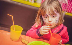Child at a birthday party.