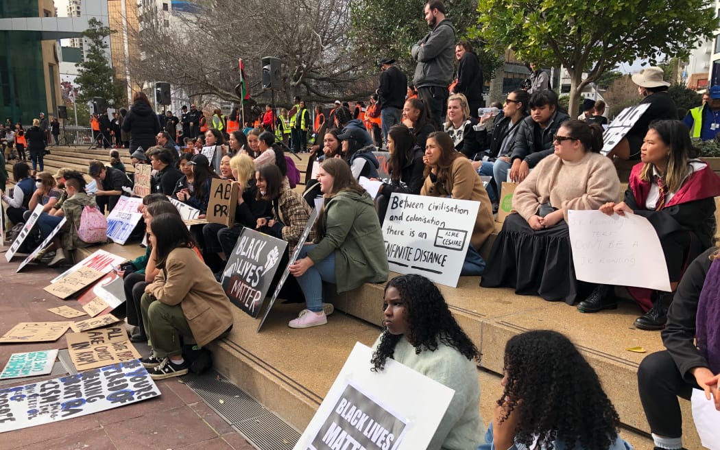 Protesters wait for the start of the Black Lives Matter rally in Aotea Square in Auckland.