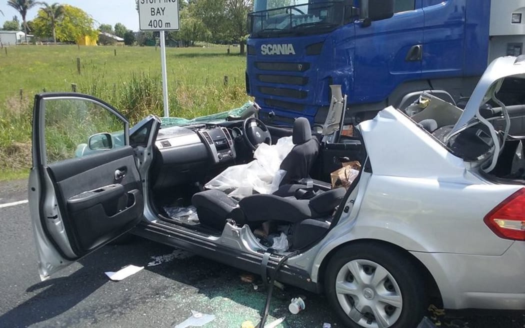 Firefighters cut two German tourists from their car after a crash on SH25 in November. One of the tourists later died in hospital.