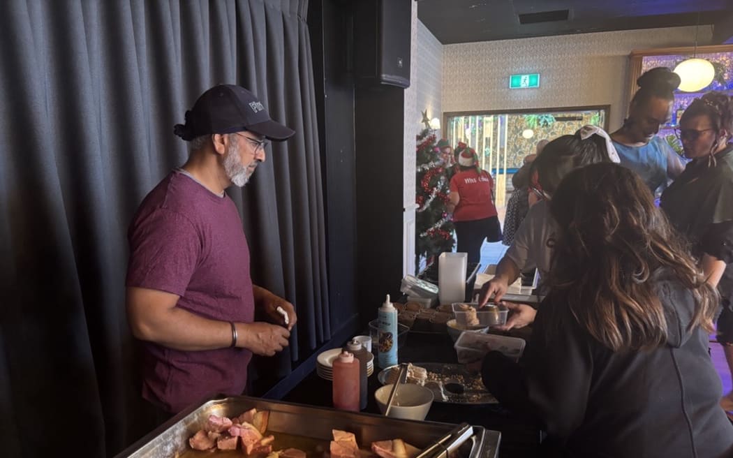 Volunteers helping to dish out the Christmas lunch.