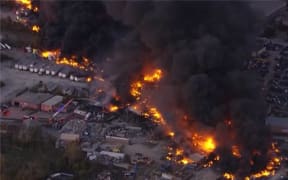 A screenshot form a video showing a fire caused by a plane crash in Lousiville, Kentucky on 4 November 2025.
