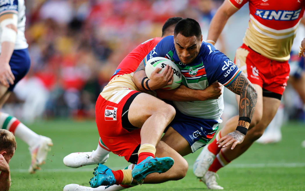 Marata Niukore charges ahead as the Warriors faced the Dolphins at Gold Coast, Australia.