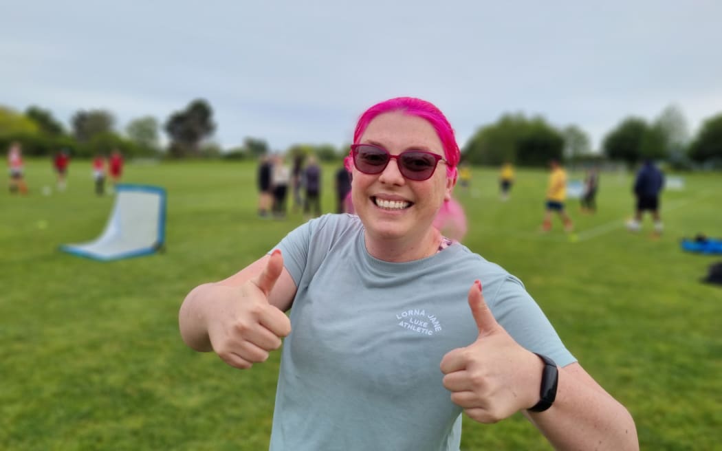 Tracy Hemingway, known locally as the DebtFreeDiva, is playing in the women's game.