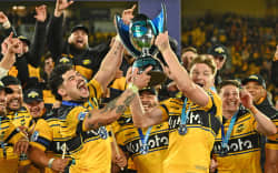 Co-captains Du’Plessis Kirifi and Jordie Barrett of the Hurricanes celebrate winning the Super Rugby title.