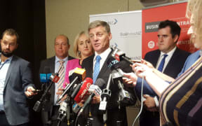 Mr English speaking to reporters after delivering his state of the nation speech.
