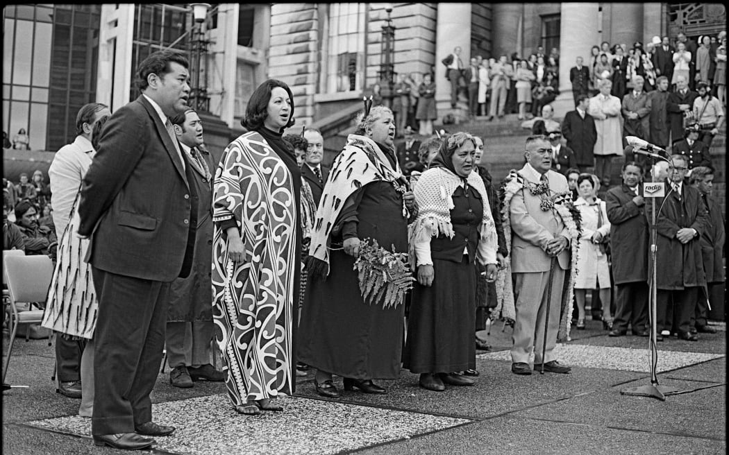 MP Whetū Tirikātene-Sullivan (second from left) was a leader in contemporary Māori fashion. Here outside Parliament in 1975, receiving Whina Cooper’s hīkoi.