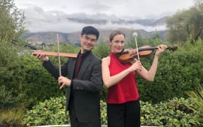 Percussionist Naoto Segawa and violinist Monique Lapins